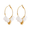 Resin sun geometric earrings in gold-plated stainless steel with resin.