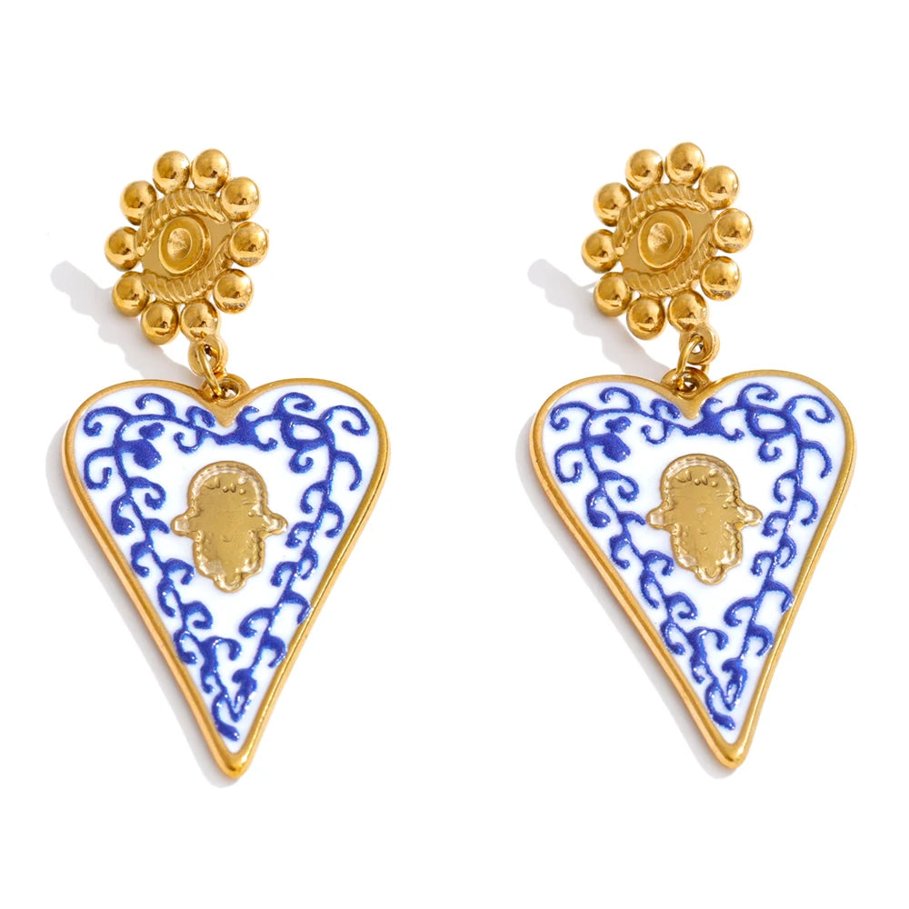 Blue enamel heart earrings in gold-plated stainless steel with enamel.