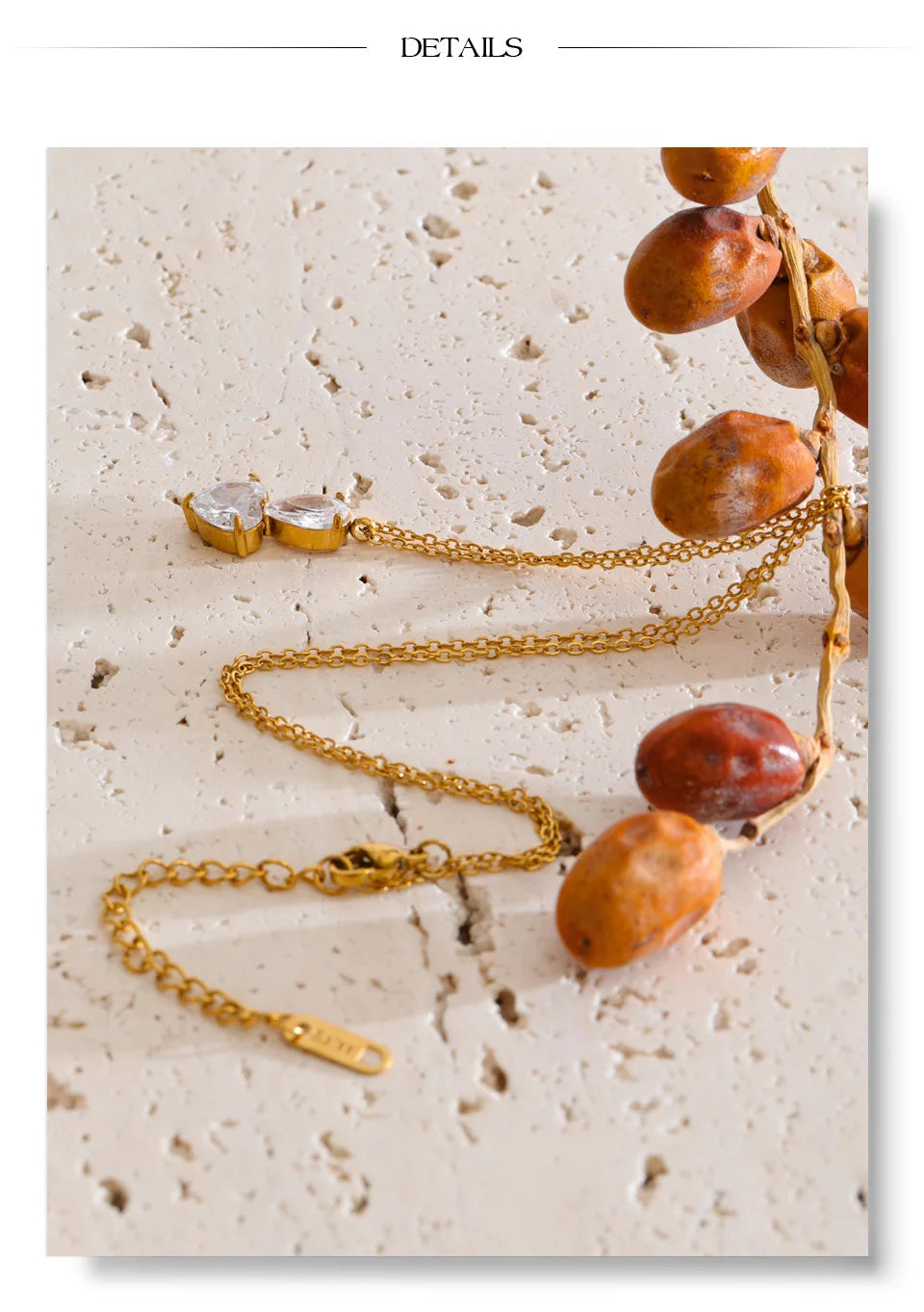 Cubic zirconia geometric necklace in gold-plated stainless steel with cubic zirconia.