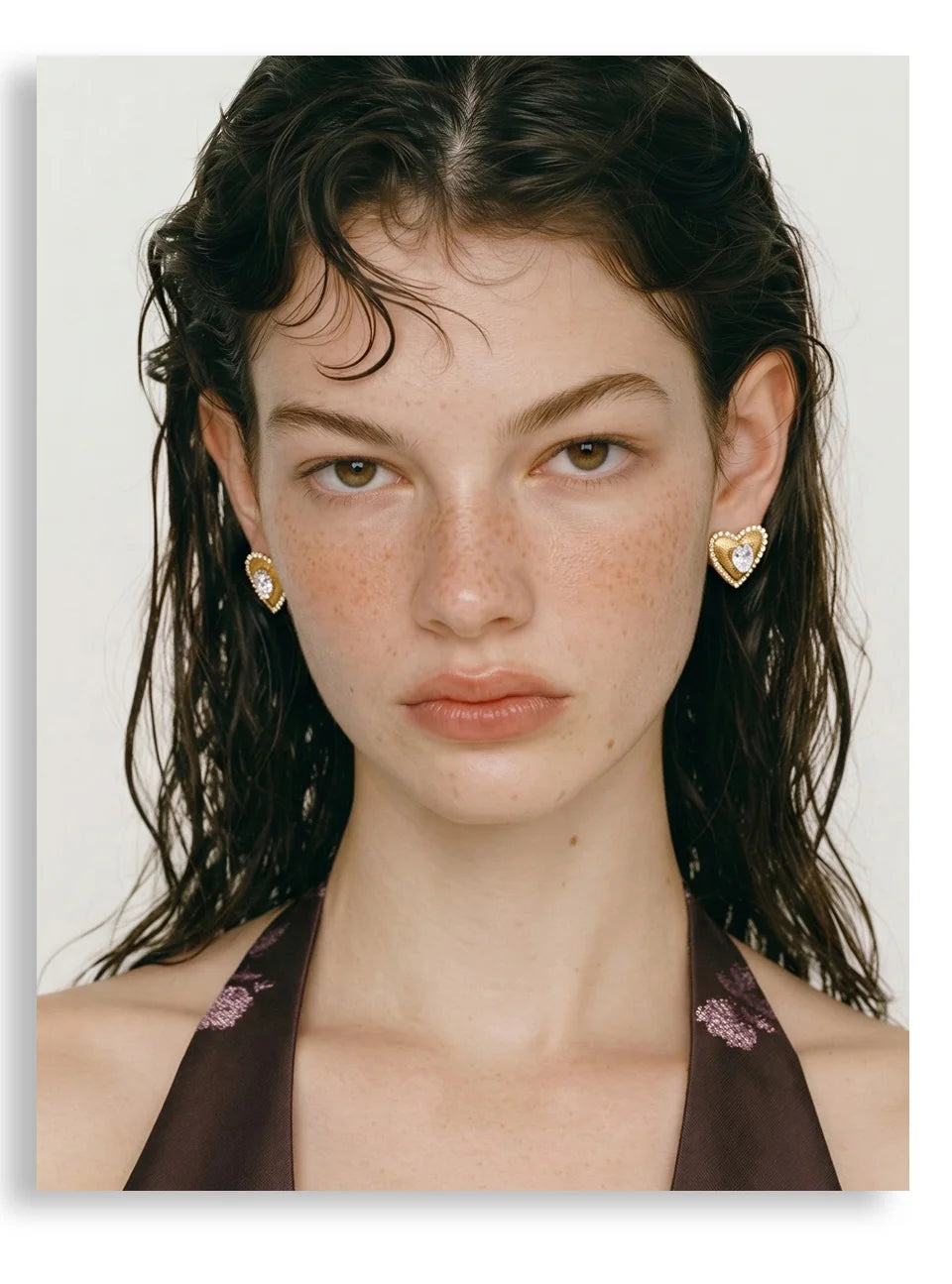 Cubic zirconia heart earrings in gold-plated stainless steel with cubic zirconia.