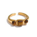 Natural stone geometric ring in 18K gold-plated stainless steel with natural stone.
