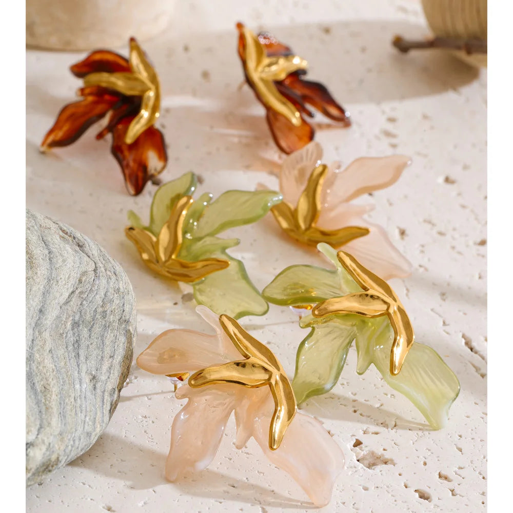 Green resin acrylic earrings in gold-plated stainless steel with resin and acrylic.