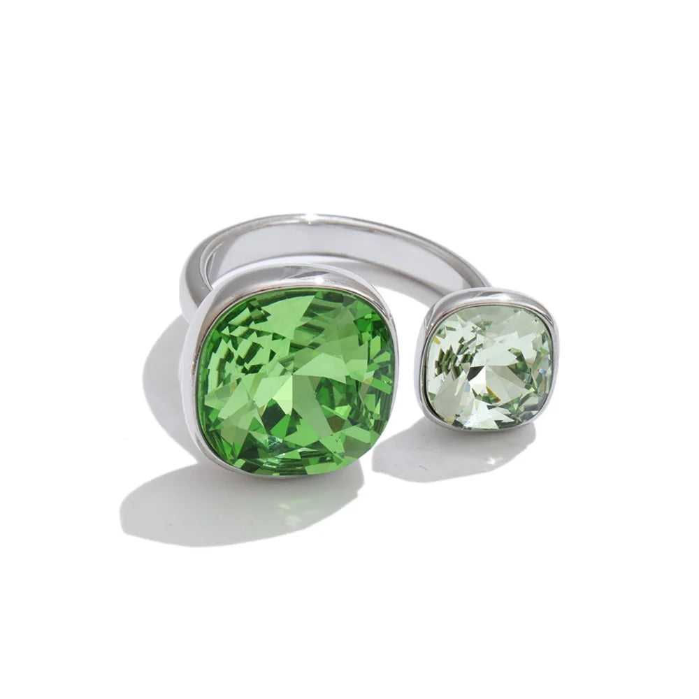Cubic zirconia geometric ring in 18K gold-plated stainless steel with cubic zirconia.
