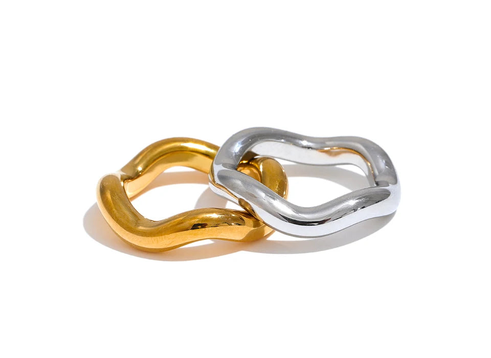 Geometric ring in 18K gold-plated stainless steel.