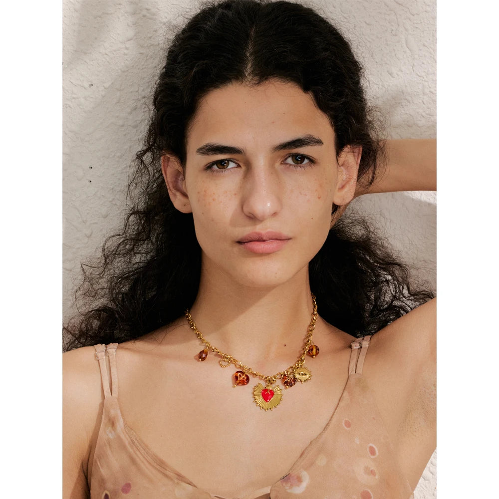 Sun geometric necklace in gold-plated stainless steel.