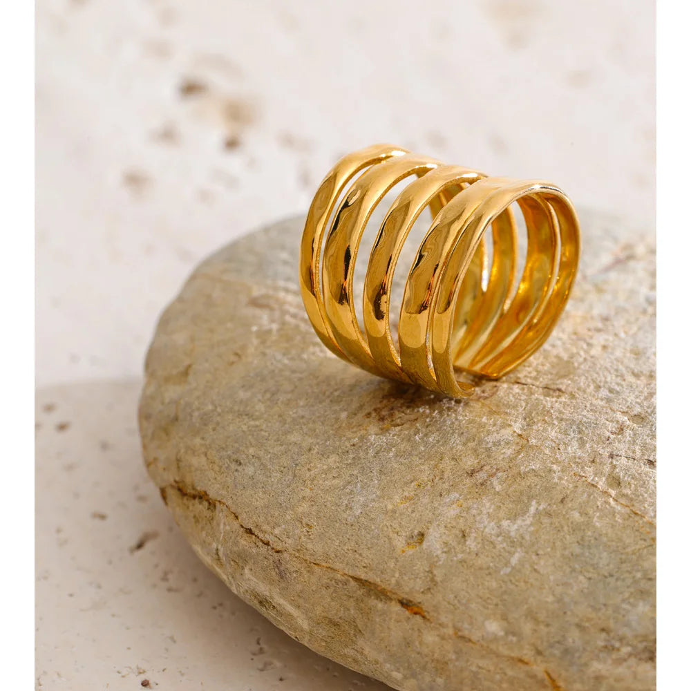 Geometric layered ring in 18K gold-plated stainless steel.