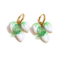 White geometric earrings in gold-plated stainless steel.