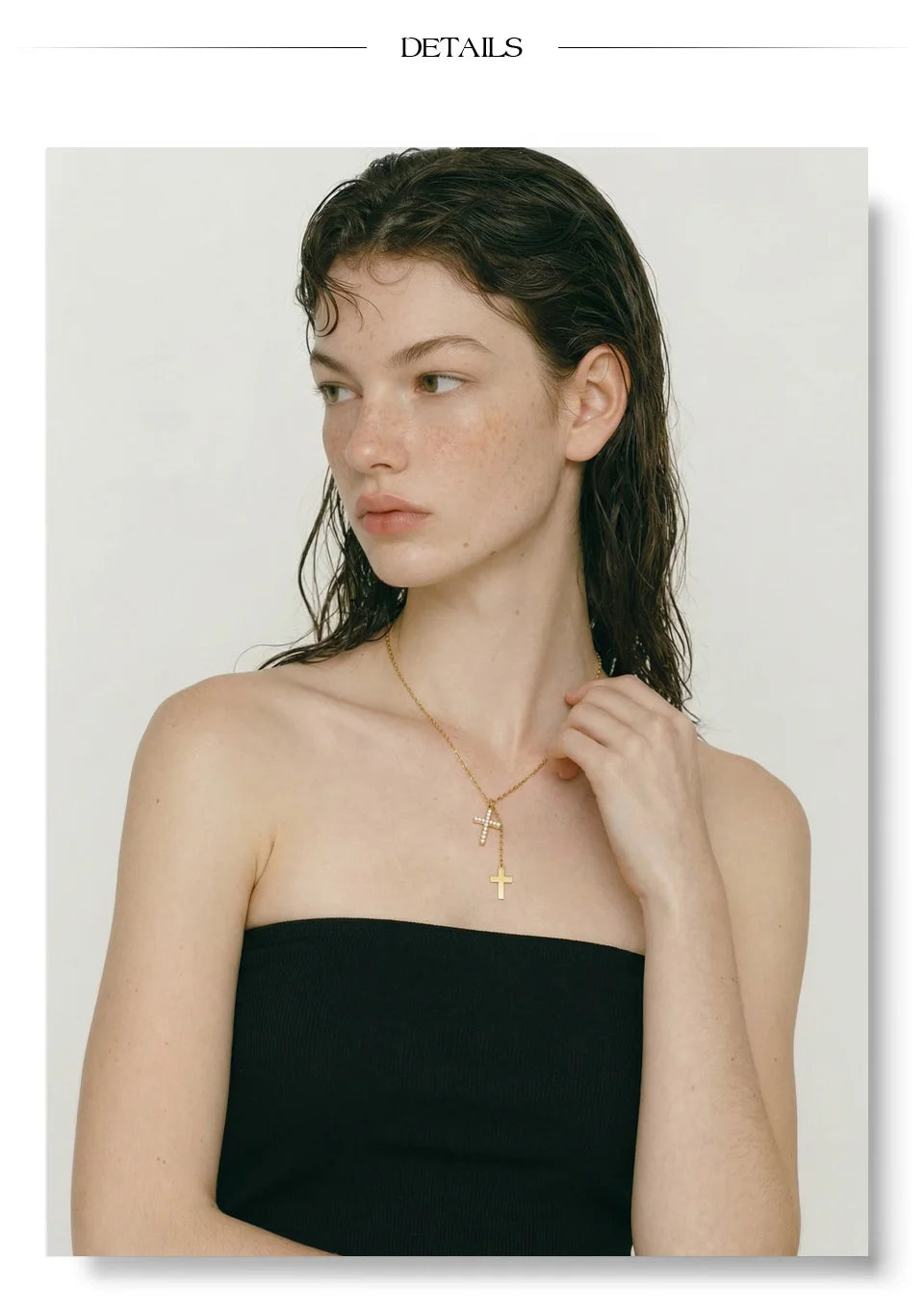 Cubic zirconia cross chain necklace in gold-plated stainless steel with cubic zirconia.