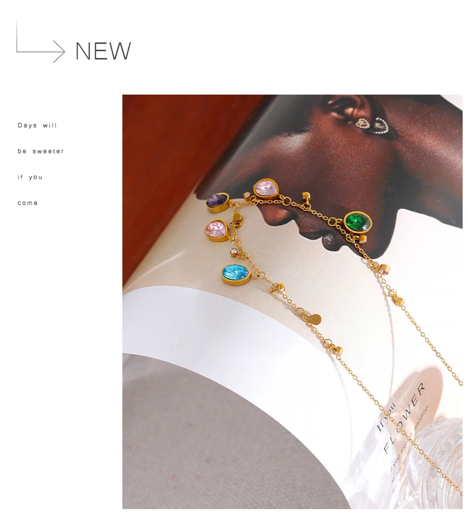 Cubic zirconia multi-color geometric necklace in gold-plated stainless steel with cubic zirconia.