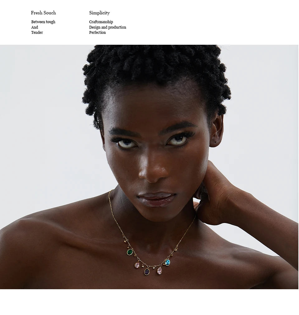 Cubic zirconia multi-color geometric necklace in gold-plated stainless steel with cubic zirconia.