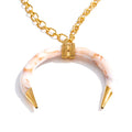 Resin geometric necklace in gold-plated stainless steel with resin.