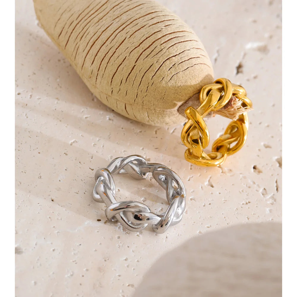 Geometric chain ring in 18K gold-plated stainless steel.