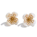 Resin flower earrings in gold-plated stainless steel with resin.