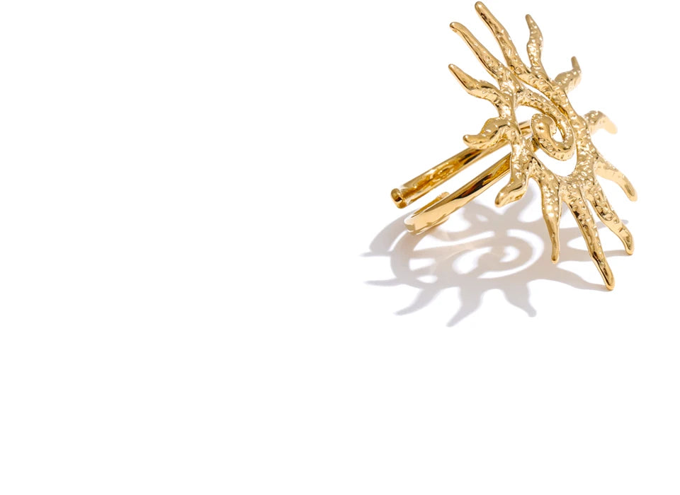 Sun geometric ring in 18K gold-plated stainless steel.