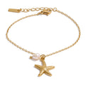 Freshwater pearl star geometric bracelet in gold-plated stainless steel with freshwater pearl.