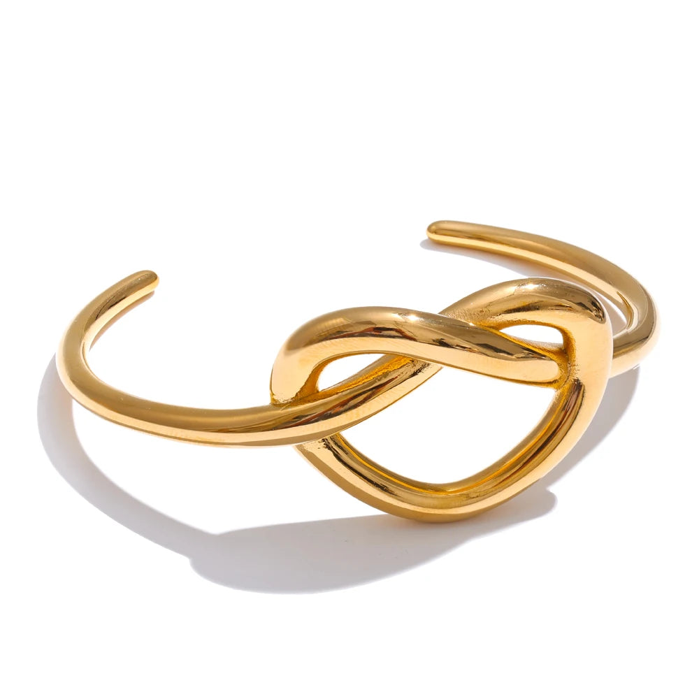 Heart bracelet in gold-plated stainless steel.
