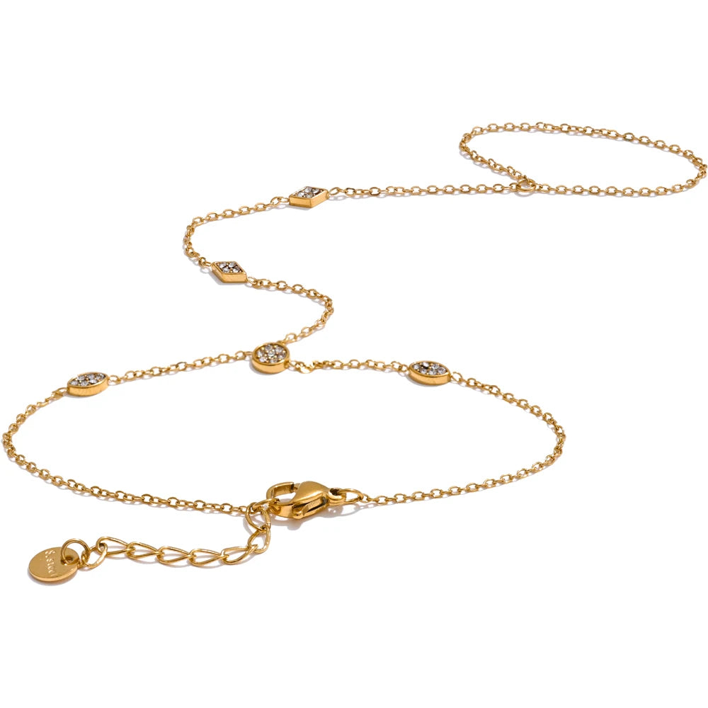 Cubic zirconia geometric chain necklace in gold-plated stainless steel with cubic zirconia.