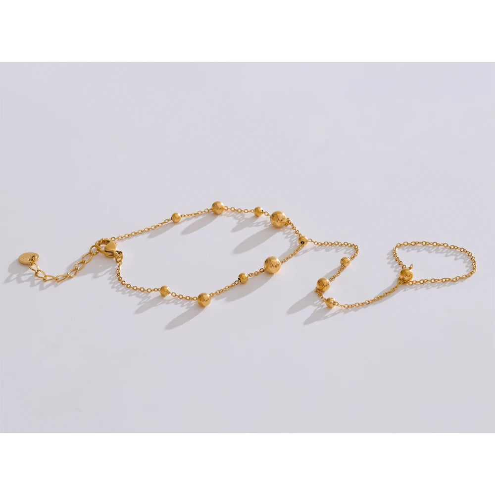 Cubic Zirconia Beaded Chain Bracelet — Gold-Plated Stainless Steel with Cubic Zirconia · PS2212