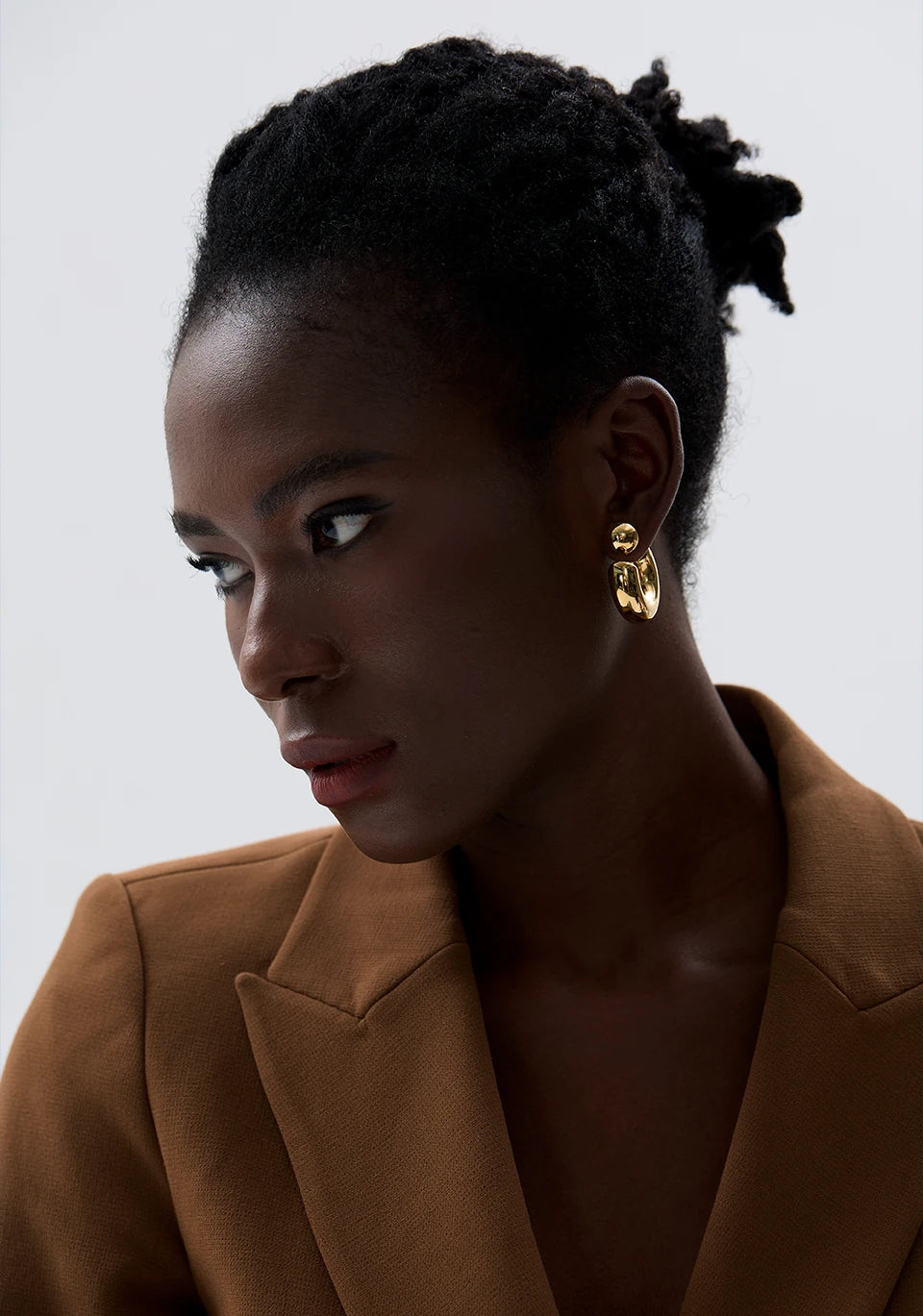 Geometric earrings in gold-plated stainless steel.