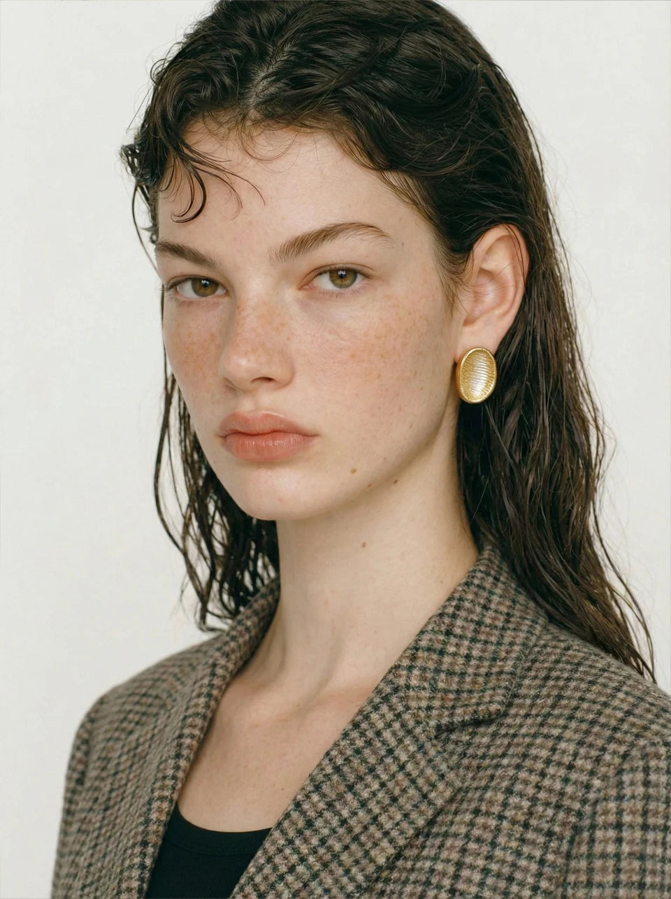 Geometric earrings in gold-plated stainless steel.
