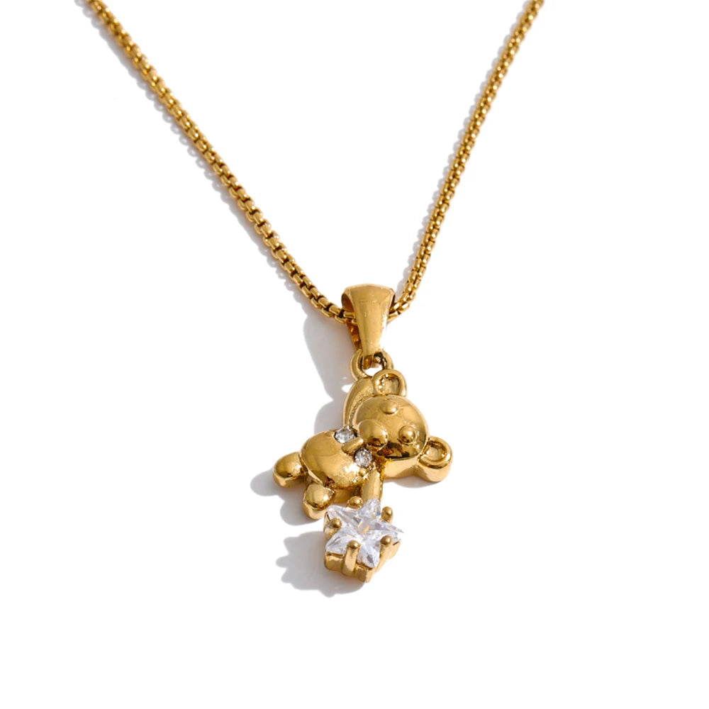 Cubic zirconia star geometric necklace in gold-plated stainless steel with cubic zirconia.