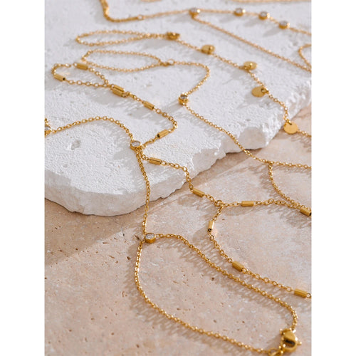Cubic zirconia geometric chain necklace in gold-plated stainless steel with cubic zirconia.