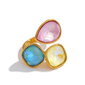 Crystal multi-color geometric ring in 18K gold-plated stainless steel with crystal.