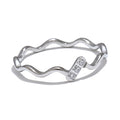 Cubic zirconia minimalist geometric ring in gold-plated stainless steel with cubic zirconia.