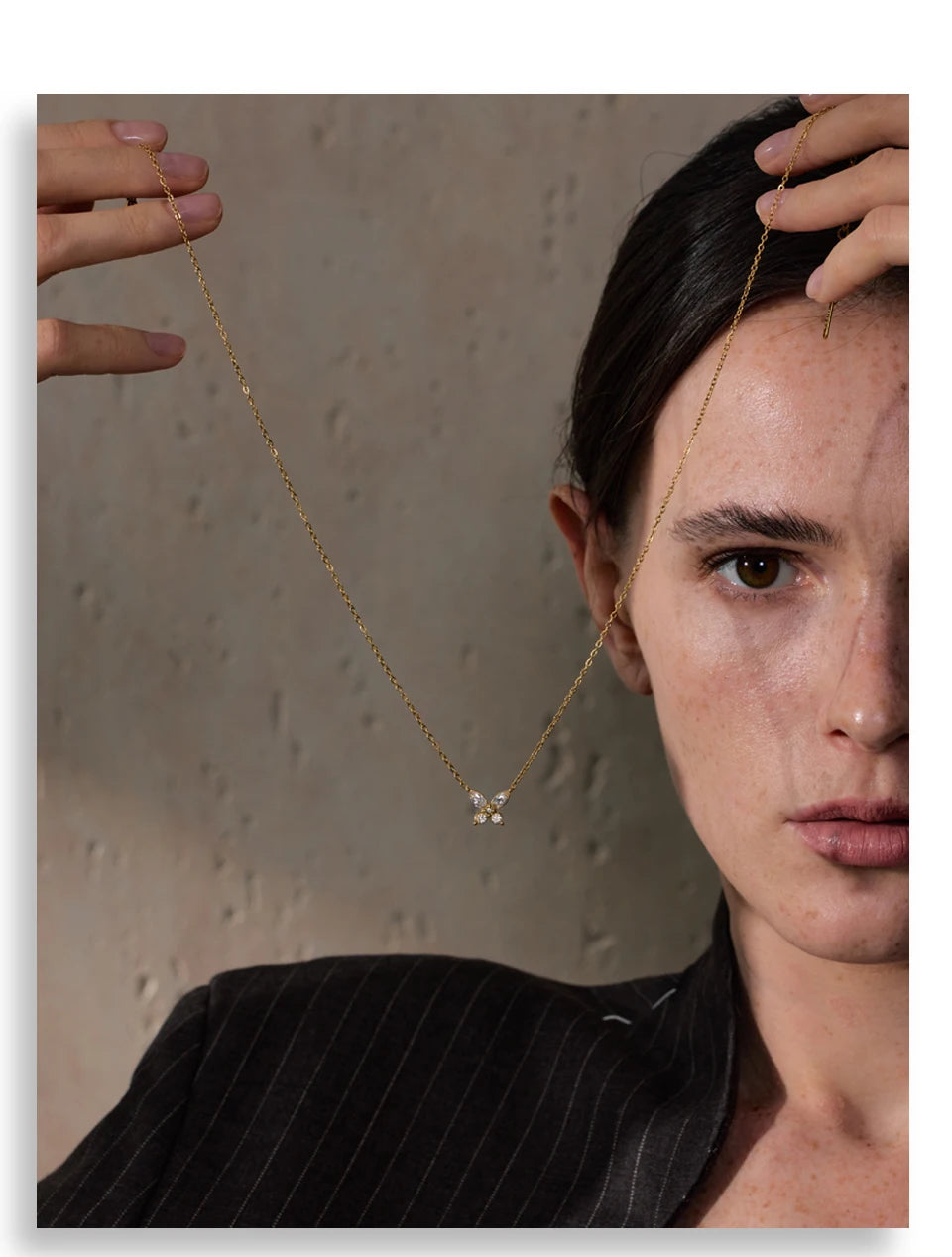 Cubic zirconia butterfly necklace in gold-plated stainless steel with cubic zirconia.