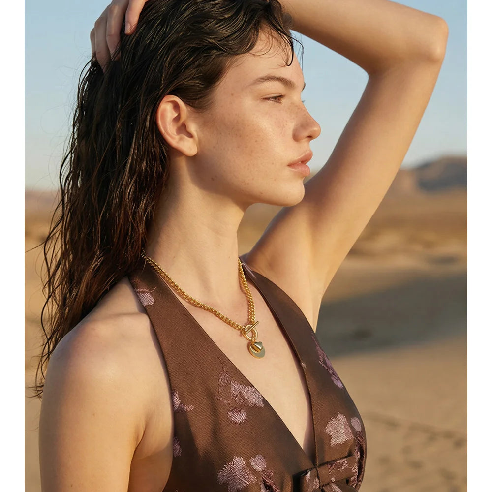 Geometric chain necklace in gold-plated stainless steel.