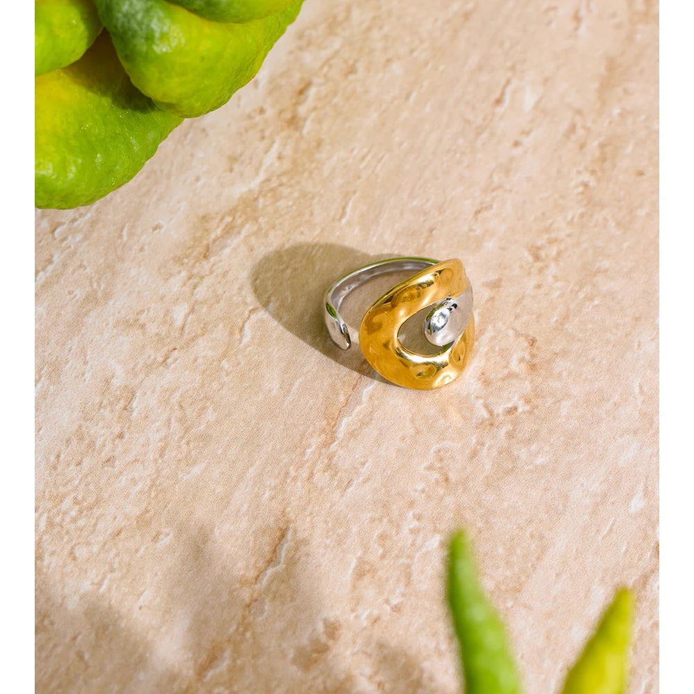 Geometric ring in 18K gold-plated stainless steel.