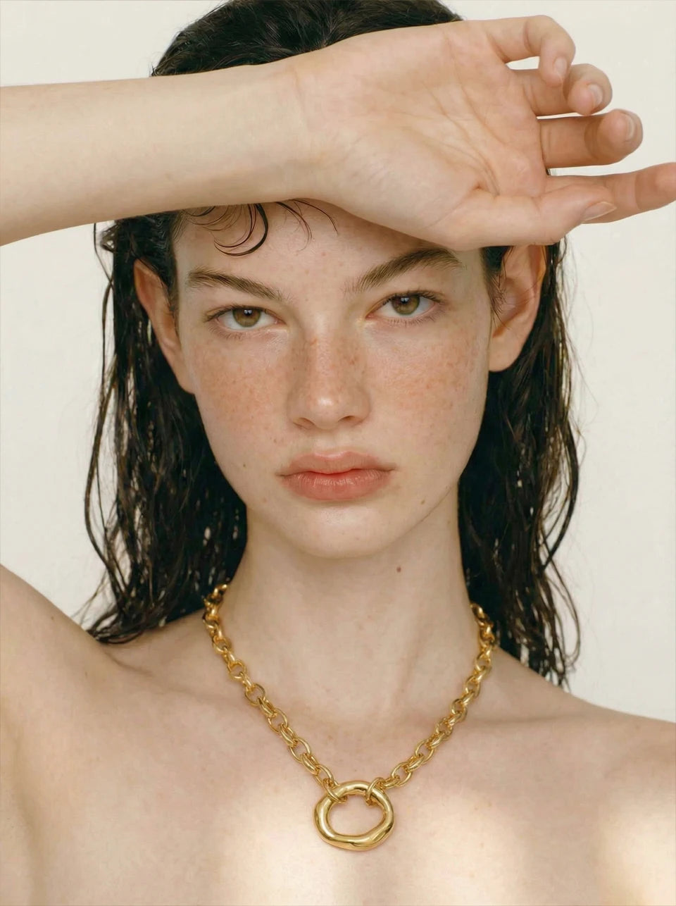 Coin geometric necklace in gold-plated stainless steel.