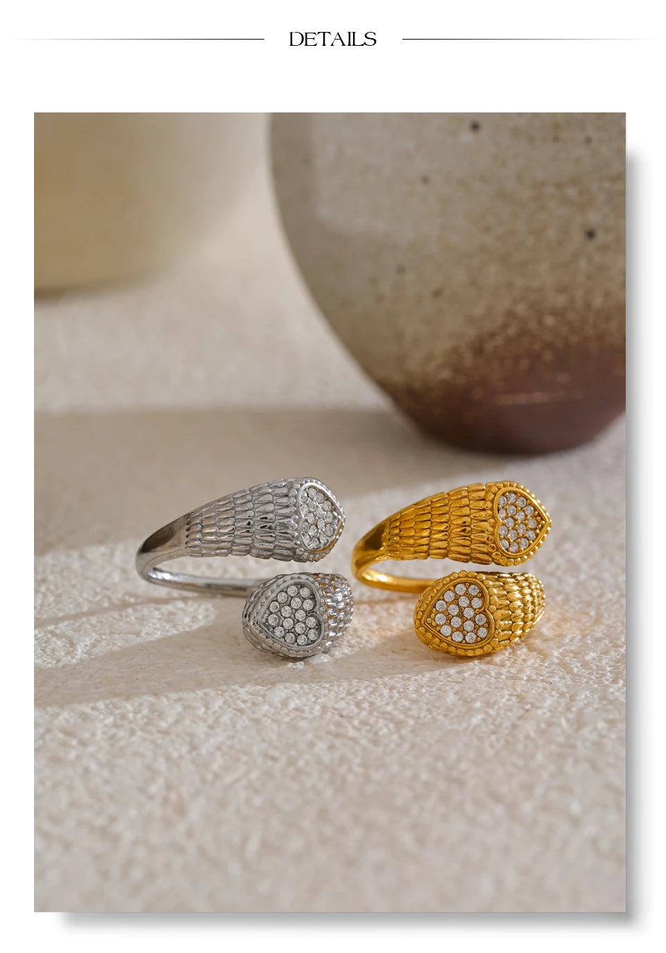 Cubic zirconia heart snake ring in gold-plated stainless steel with cubic zirconia.