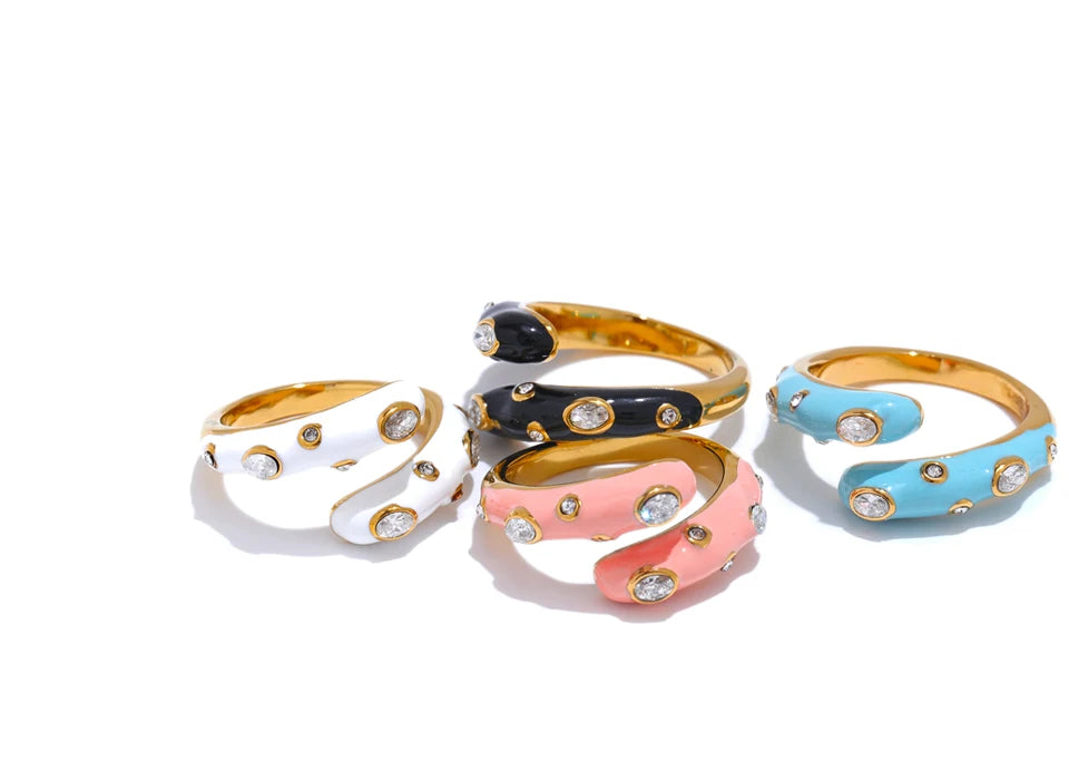 Black cubic zirconia enamel ring in 18K gold-plated stainless steel with cubic zirconia and enamel.