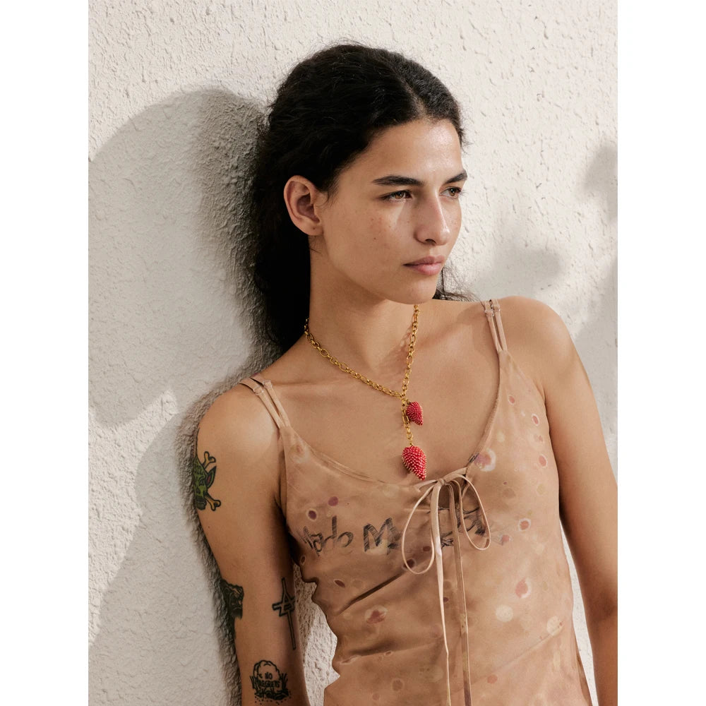 Red heart geometric necklace in gold-plated stainless steel.