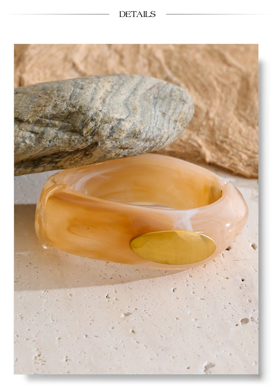 Resin acrylic geometric bracelet in gold-plated stainless steel with resin and acrylic.