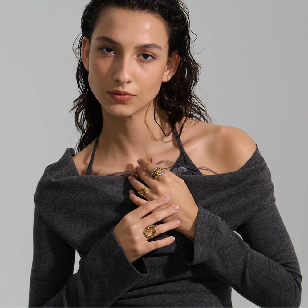 Geometric layered ring in 18K gold-plated stainless steel.