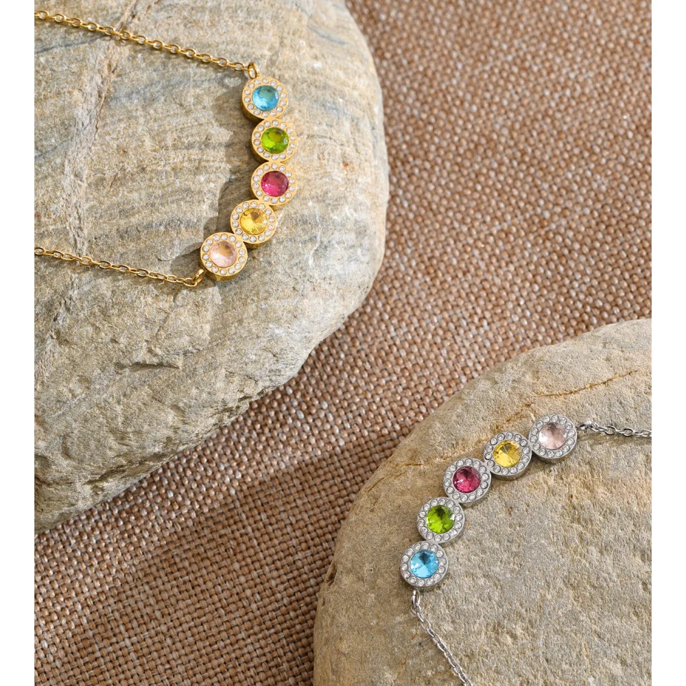 Cubic zirconia multi-color geometric necklace in gold-plated stainless steel with cubic zirconia.