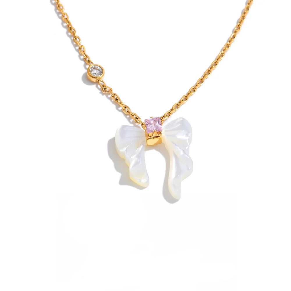 Gold-plated stainless steel necklace with a shell pendant.
