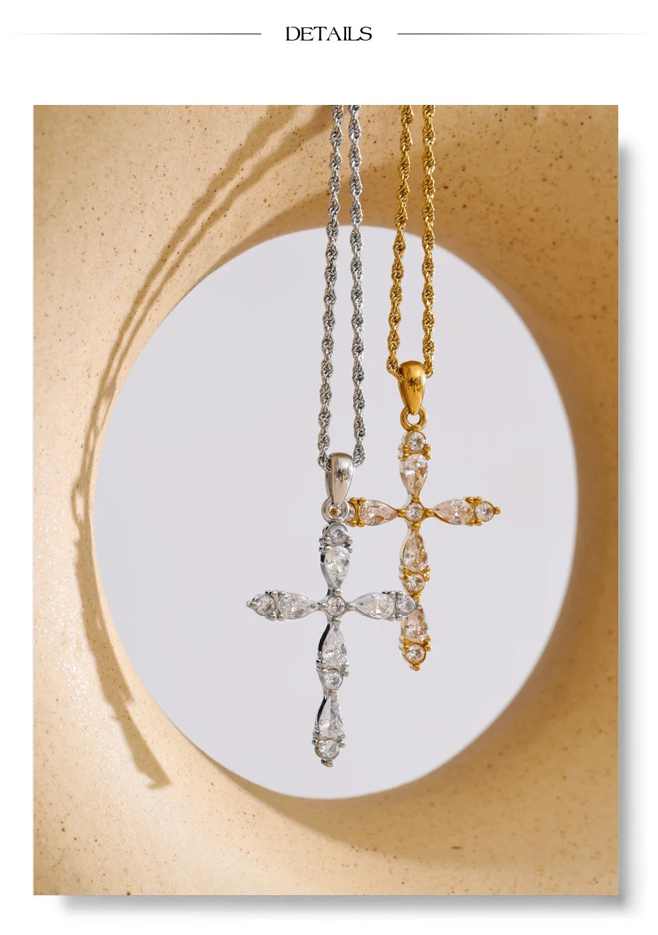 Cubic zirconia cross necklace in gold-plated stainless steel with cubic zirconia.