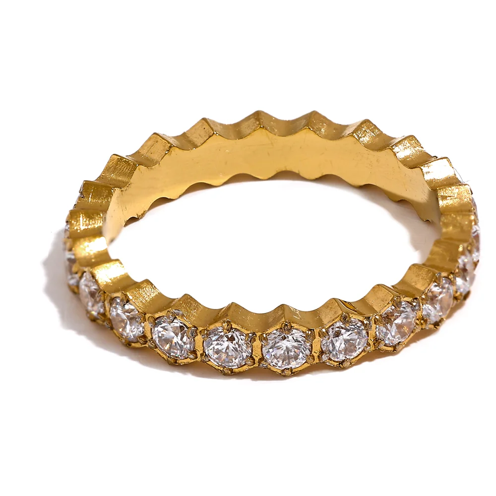 White cubic zirconia geometric ring in gold-plated stainless steel with cubic zirconia.