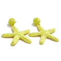 Green star earrings in gold-plated stainless steel.