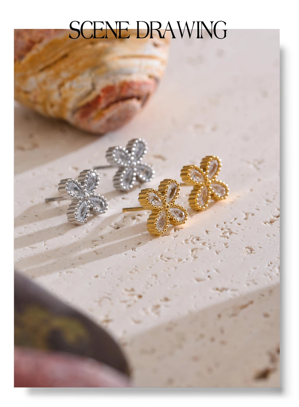 Cubic zirconia flower earrings in gold-plated stainless steel with cubic zirconia.