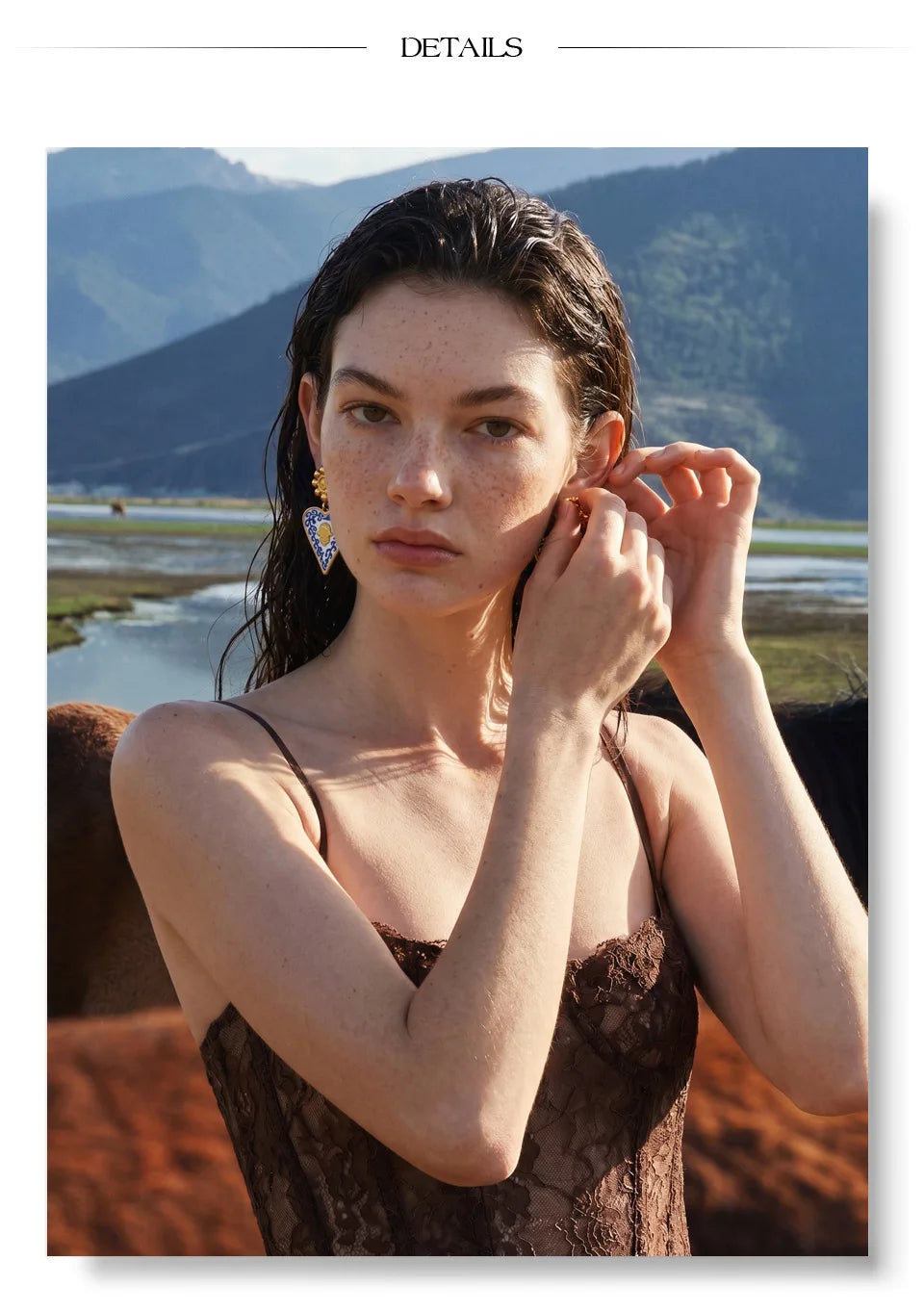 Blue enamel heart earrings in gold-plated stainless steel with enamel.