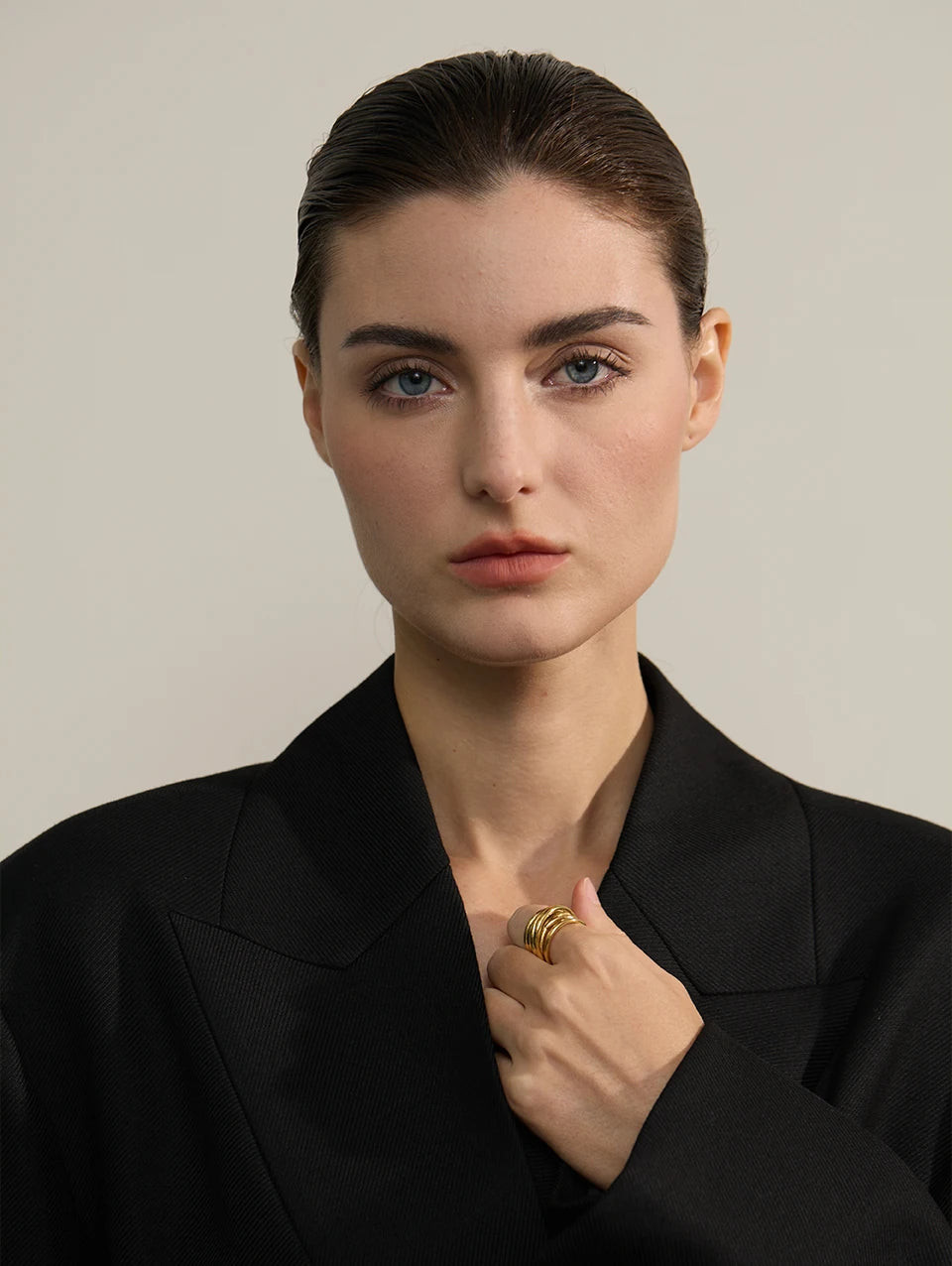 Geometric ring in 18K gold-plated stainless steel.