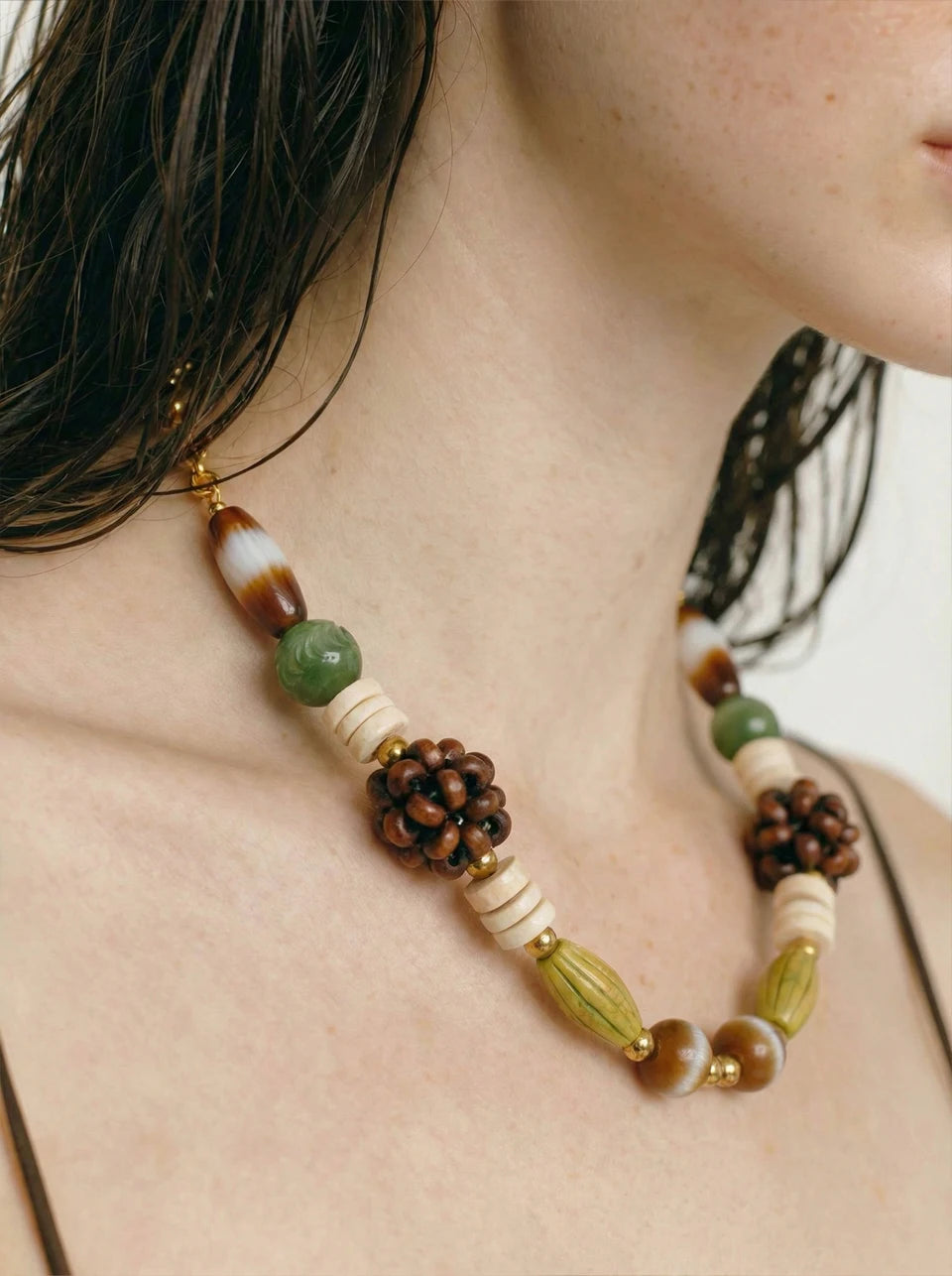 Beaded geometric chain necklace in gold-plated stainless steel.