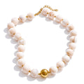 Resin beaded multi-color necklace in gold-plated stainless steel with resin.