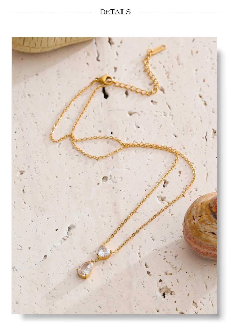 Cubic zirconia heart necklace in gold-plated stainless steel with cubic zirconia.