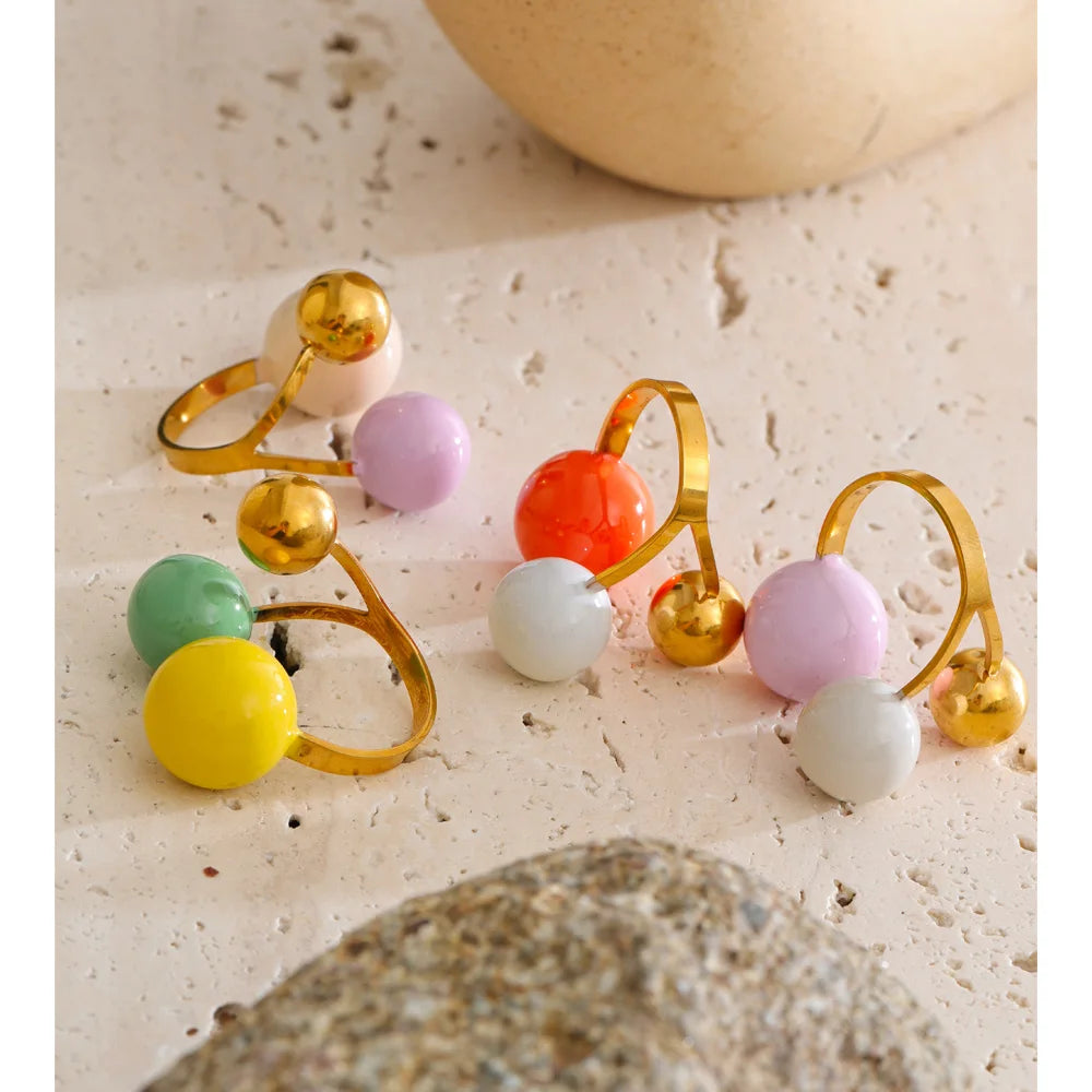 Enamel multi-color geometric ring in 18K gold-plated stainless steel with enamel.