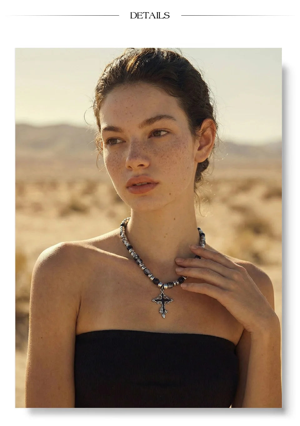 Natural stone cross beaded necklace in gold-plated stainless steel with natural stone.